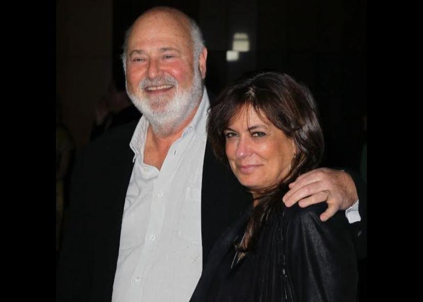 photo of Rob and Michele Reiner at an event, close together,